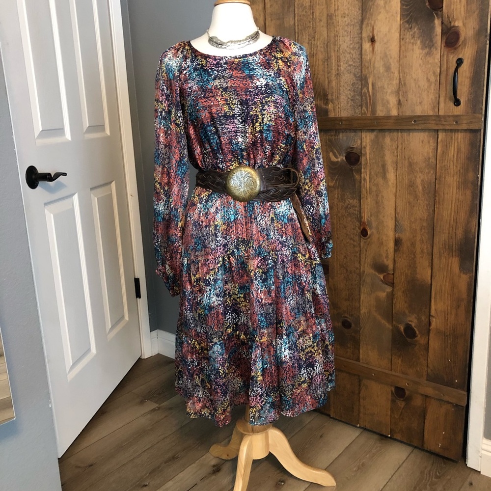 Cute boho dress! Colorful light weight fabric. Fully lined. Size large.